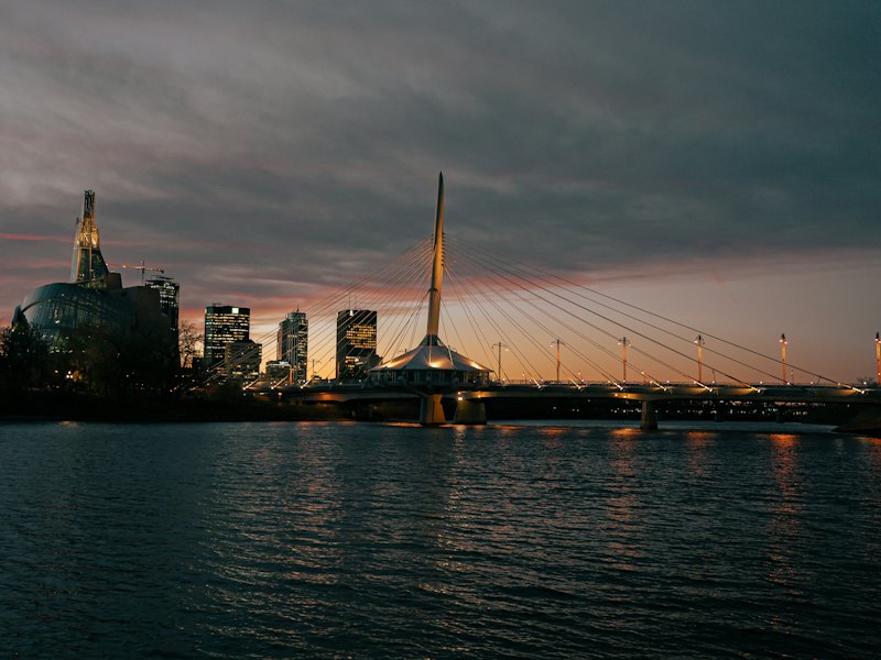 Esplanade Riel footbridge and the Winnipeg skyline at dusk
